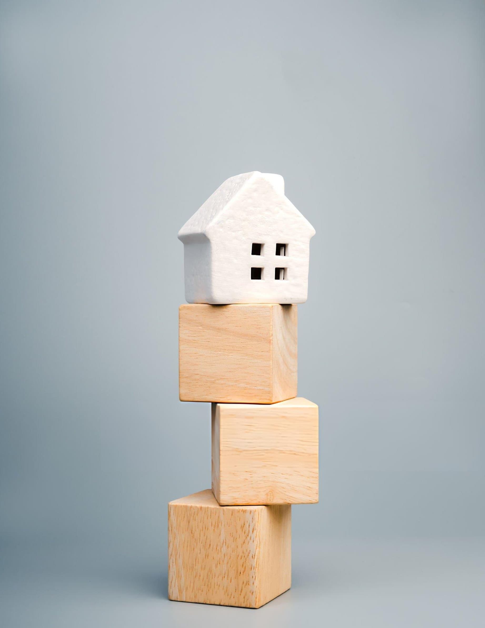 Blocks stacked on each other with a house on top of them indicating the ranking of things